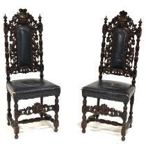 Pair of Victorian carved oak hall chairs,