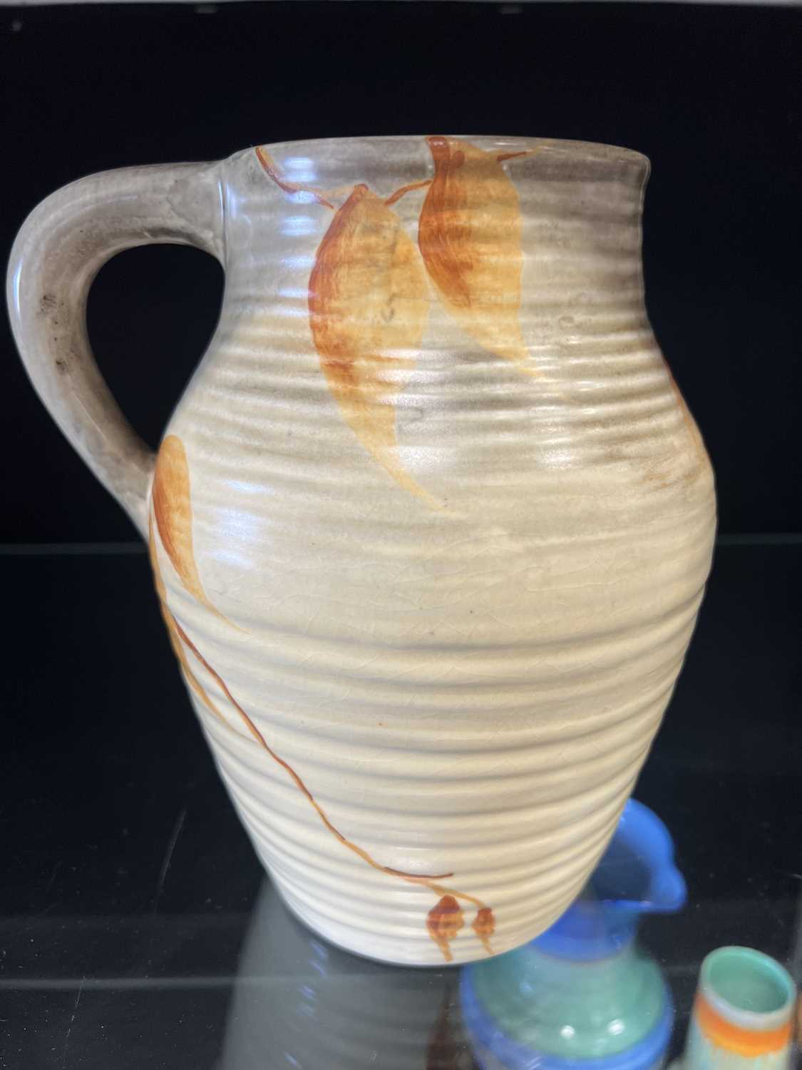 Clarice Cliff, a small Isis jug, circa 1935 - Image 2 of 5