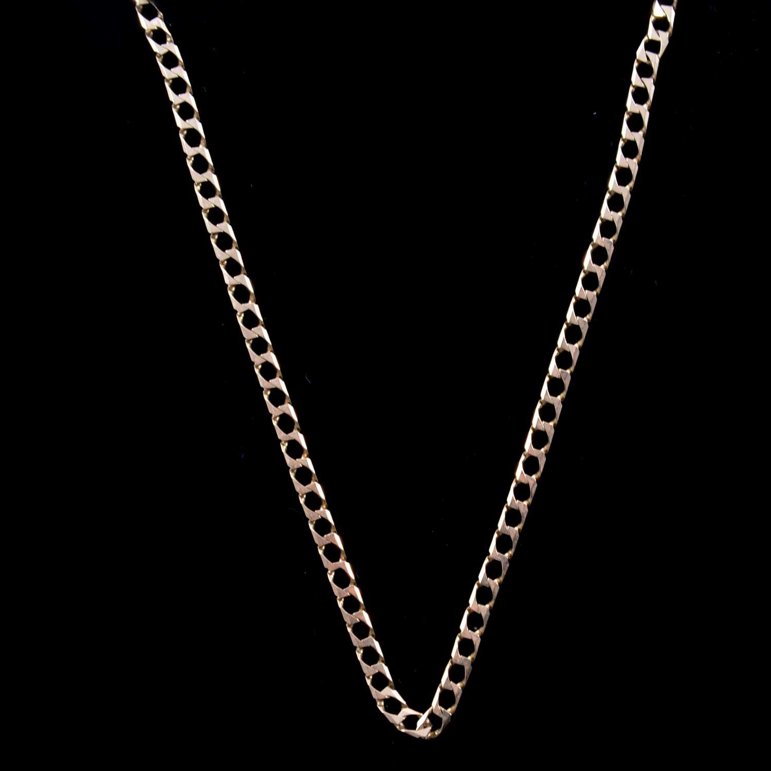 A 9 carat gold flat curb link chain.