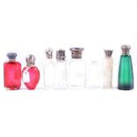 Cranberry glass and silver heart shaped scent bottle, and others,