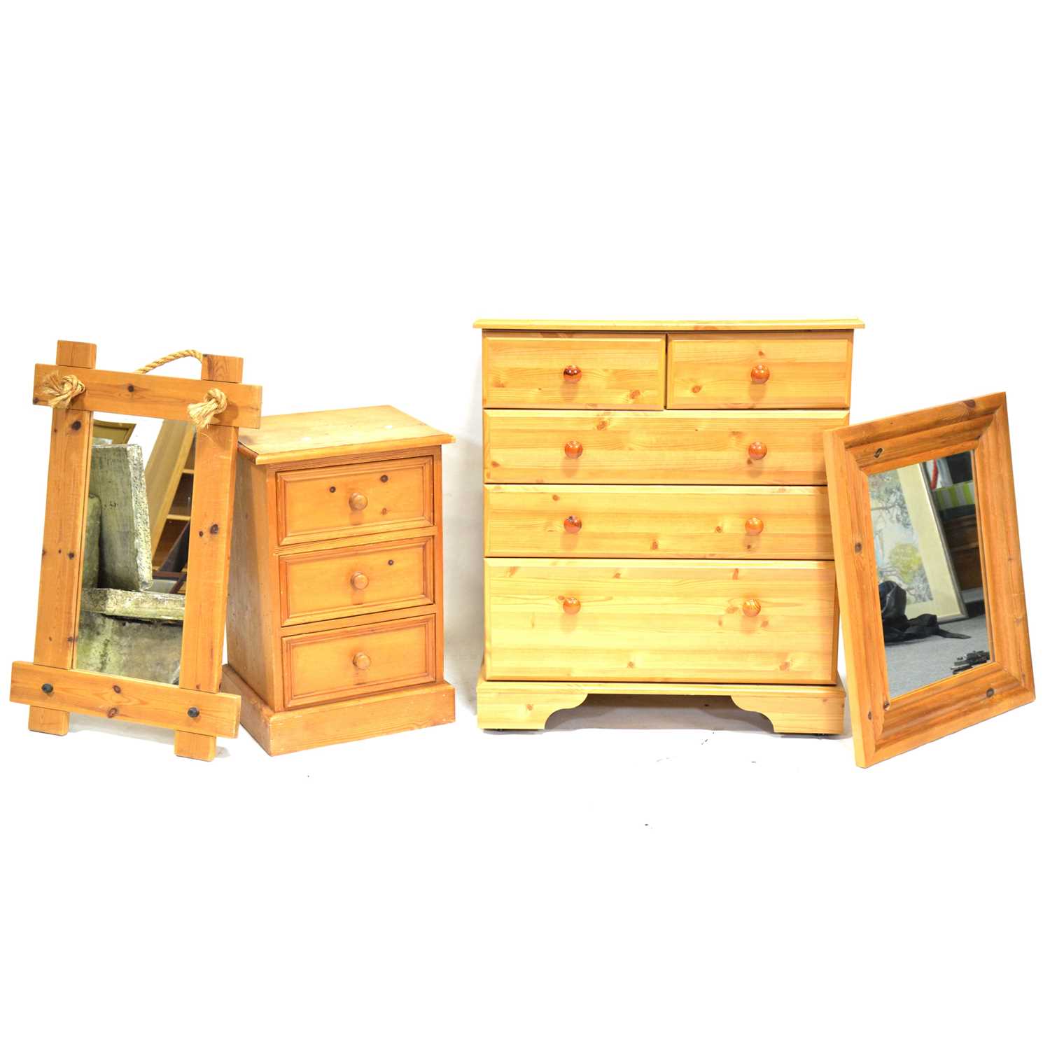 Modern pine effect chest of drawers, two mirrors and a bedside cabinet,