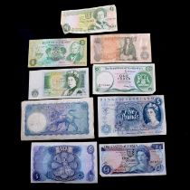 A collection of British banknotes,