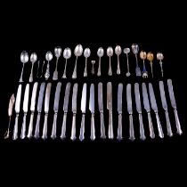 Assorted silver teaspoons, tongs, silver-handled butterknives, etc