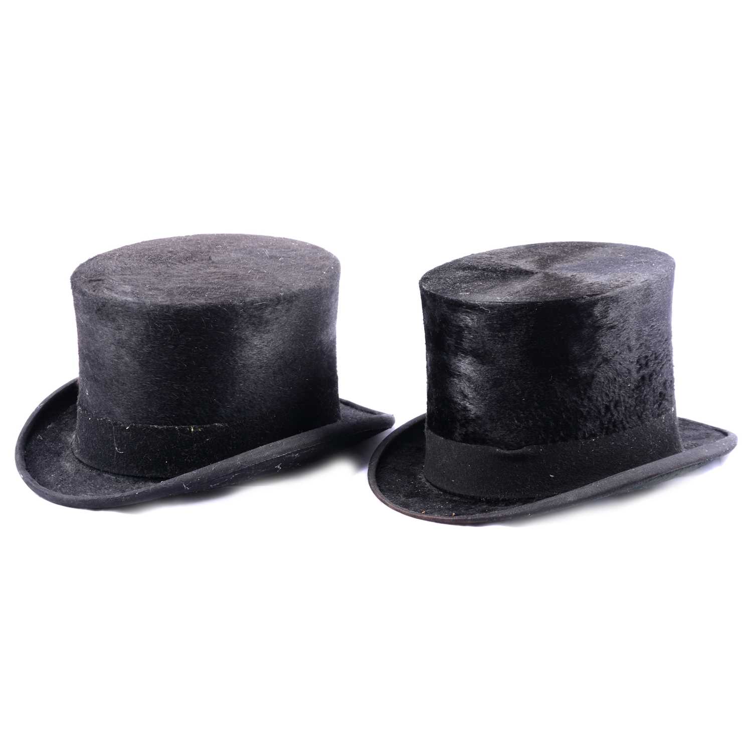 Five black top hats,