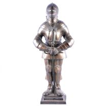 A fireside companion set modelled as a knight in armour