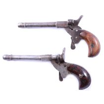 Pair of .22 blank firing dog scaring pistols.