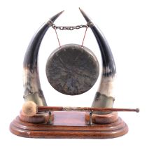 Table gong with cow horns