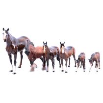 A Beswick brown matt glazed Shire horse, five Beswick brown gloss horses and ponies.