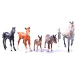 Eleven Beswick, Doulton and other horse and dog figurines