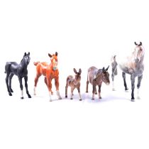 Eleven Beswick, Doulton and other horse and dog figurines
