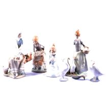 Six Lladro figurines.