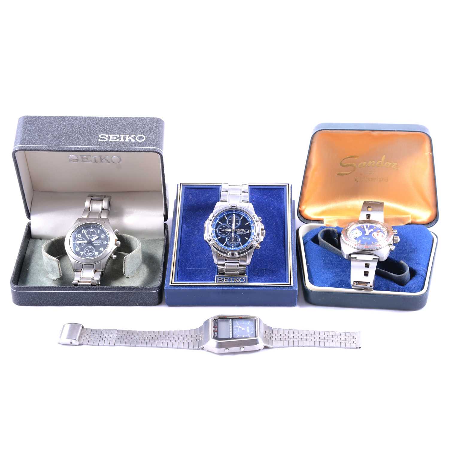 Two Seiko wristwatches, Sandoz watch and a Buler watch,