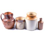 Collection of stoneware jars, jugs and bottles