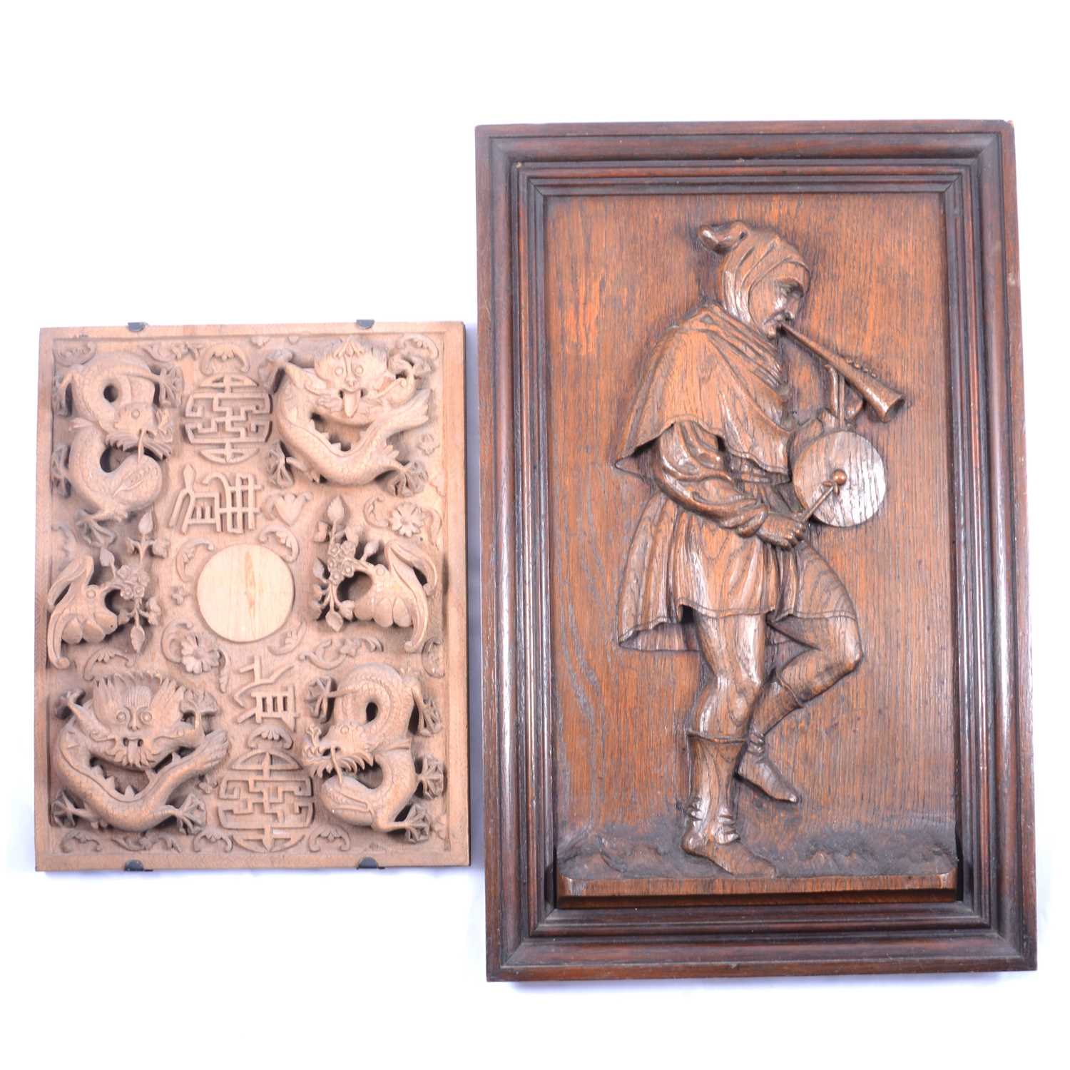 Two carved wood panels,