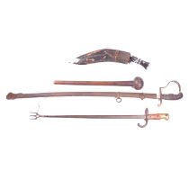 German WWI Artillery Officer's sword, a bayonet, knobkerrie and Kukri knife