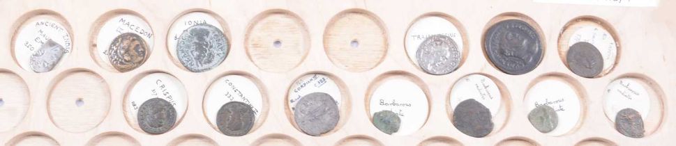Nineteen Roman coins, some replicas.