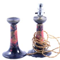 Pair of William Moorcroft Pomegranate candlesticks, probably for Liberty,