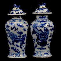 Pair of Chinese porcelain covered vases,