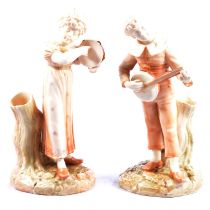 Pair of Royal Worcester ivory ground figurines,