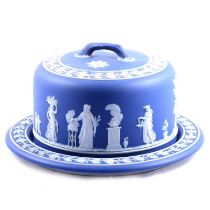 Wedgwood blue and white jasper ware cheese dome, and a Nao figure,
