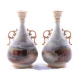 Pair of Royal Worcester vases with highland cattle by Harry Stinton