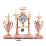 French gilt metal and rouge marble three-piece clock garniture,