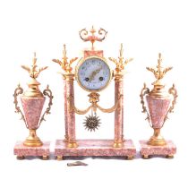 French gilt metal and rouge marble three-piece clock garniture,