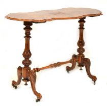 Victorian figured walnut stretcher table,