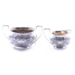 Silver milk jug and sugar bowl,