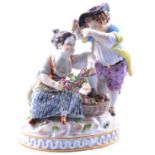 Meissen porcelain group, couple with a flower basket,