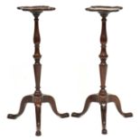 Pair of George III mahogany candle stands,