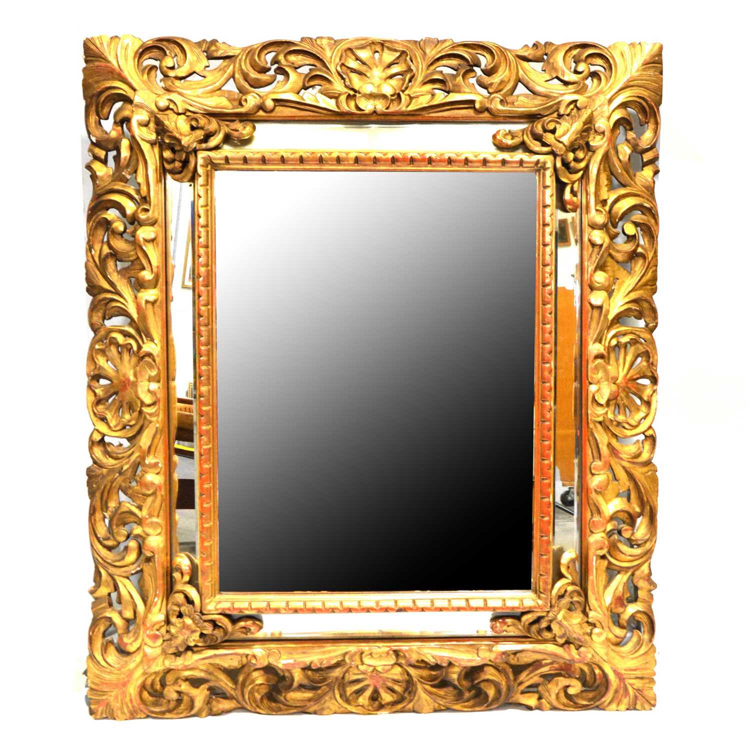 Large carved wooden gilt gesso cushion wall mirror, 19th Century,