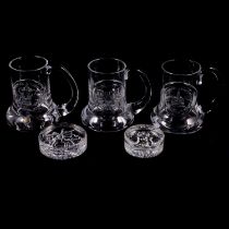 Collection of crystal tankards and paperweights,