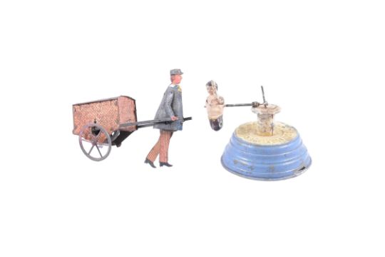 Early 20th Century French tinplate toy, and a German tinpate toy