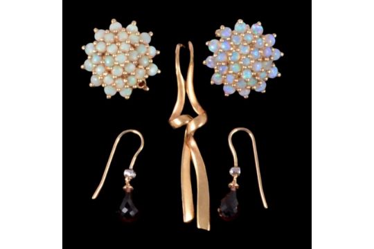 Three pairs of earrings for pierced ears, gold, garnet and diamond, opal.