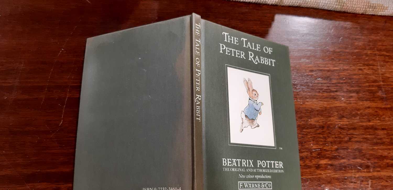 Set of twenty three Peter Rabbit Books, in a themed book rack, - Image 8 of 17