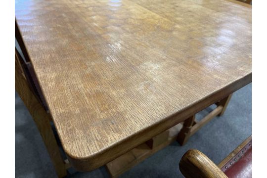 Robert 'Mouseman' Thompson of Kilburn, an oak 5' dining table and six chairs - Image 8 of 16