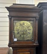 A mid 18th century inlaid oak eight day longcase clock with a square brass dial, Richard Bullock,