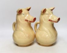 A pair of Sarreguemines ‘pig’ jugs, impressed numbers 3318 to each, 24cm