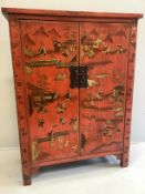 An India Jane Chinese scarlet lacquer two door cabinet, width 128cm, depth 54cm, height 167cm