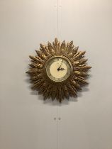 A Smith's electric sunburst wall timepiece, diameter 50cm