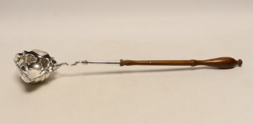 A George II silver toddy ladle, with turned wooden handle, London, 1752, 36.3cm.