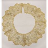 A long 19th century mixed Brussels lace collar, with 20 needle lace oval insertions, a similar wider