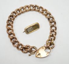 A 9ct curblink bracelet, with padlock clasp, 19cm, 22.6 grams and a 19th century brooch(a.f.)