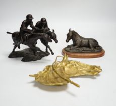 A group of metalware including two jardinieres, two brass dishes, a brass horses, head tray, a