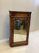 A late Victorian marquetry inlaid amboyna banded figured walnut music cabinet, width 61cm, depth