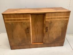 An Art Deco style banded walnut sideboard, width 136cm, depth 48cm, height 90cm