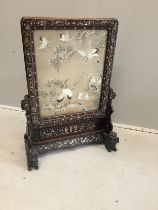 A Chinese mother of pearl inlaid hardwood table screen with silkwork panel of storks among
