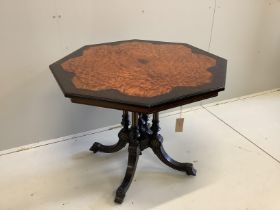 A late Victorian ebonised and amboyna octagonal centre table, width 89cm, height 71cm