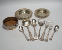 A silver plated part canteen of Kings pattern flatware, a pair of white metal tongs etc